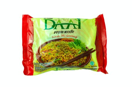 Photo for Jakarta, Indonesia - 11 November 2023 : DAAI Mi Goreng Vegan or vegan instant fried noodles is a popular instant noodle flavor for vegan diets. Isolated on white background. - Royalty Free Image