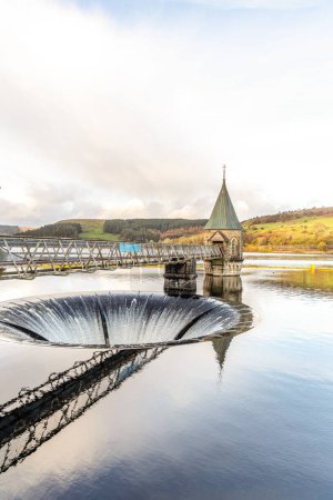 Photo for Brecon Beacons Pontsticill Reservoir in Merthyr Tydfil Wales with rainbow in the distance. - Royalty Free Image