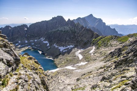 Photo for Beautiful Vysne Wahlenbergovo pleso, Krivan in Furkotska dolina view from Bystre sedlo in Slovakian high Tatra mountains. Summer panorama with great weather and blue sky. - Royalty Free Image