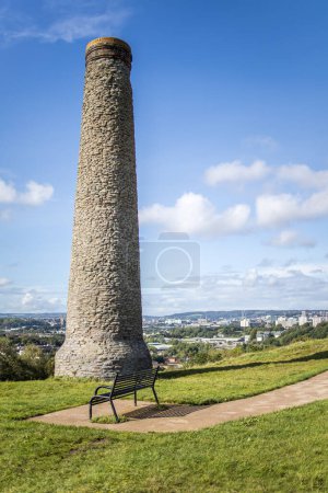 A chimney from disused copper smelting industry stands on Troopers Hill in the St George neighborhood of Bristol.