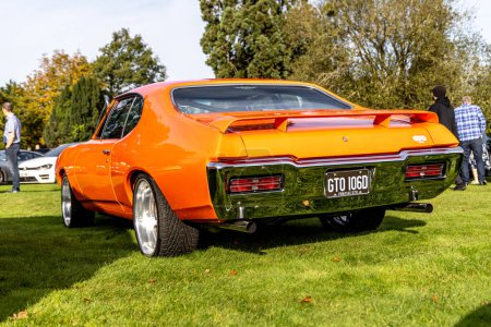 Photo for Bristol , UK - October 8, 2023: 1969 Pontiac GTO The Judge orange muscle car at a local car show - Royalty Free Image