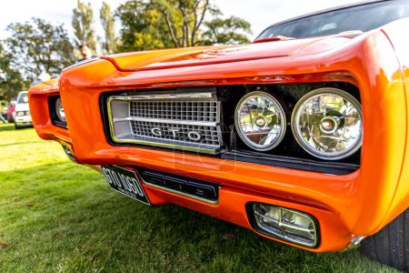 Photo for Bristol , UK - October 8, 2023: 1969 Pontiac GTO The Judge orange muscle car at a local car show - Royalty Free Image