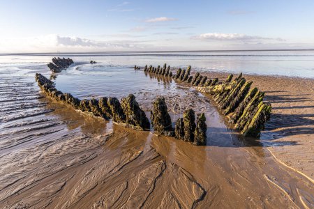 The wreck of the Norwegian ship SS Nornen which ran aground on the beach at Berrow near Burnham-on-Sea, UK in 1897 due to gale force winds.