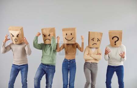 Photo for Disguised personalities wearing brown bags on heads show different emotions variety range on happy smiley puzzled upset angry mad disappointed irritated indignant dissatisfied rageful aggressive faces - Royalty Free Image
