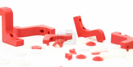 Photo for 3d printing plastic part red isolated on white background, produced from pla, horizontal view, macro - Royalty Free Image