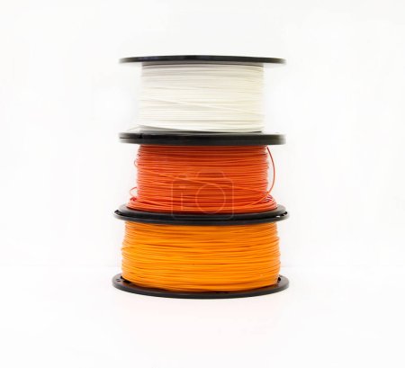 Photo for Row of spool 3d printer filament isolated on the white background vertical view, abs material - Royalty Free Image