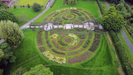 The botanic gardens in Belfast, Northern Ireland, UK see from above with lush green and colourful flowers