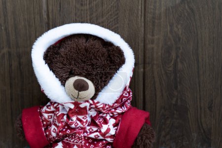Teddy bear with Christmas clothes
