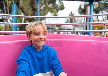 Happy child at the amusement park