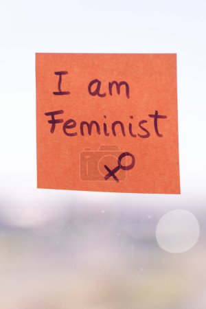 Post it with the phrase I am feminist
