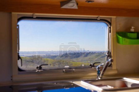 Skyline of the city of Madrid (Spain) seen from the window of a motorhome