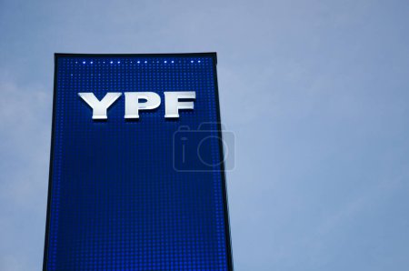 Photo for Luminous sign of a gas station of the oil company YPF on October 12, 2022, Dolores city, Buenos Aires province, Argentina. - Royalty Free Image
