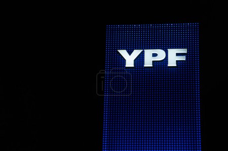 Photo for Luminous sign of a gas station of the oil company YPF on route 2. 10-12-2022. Dolores, Buenos Aires province, Argentina. - Royalty Free Image