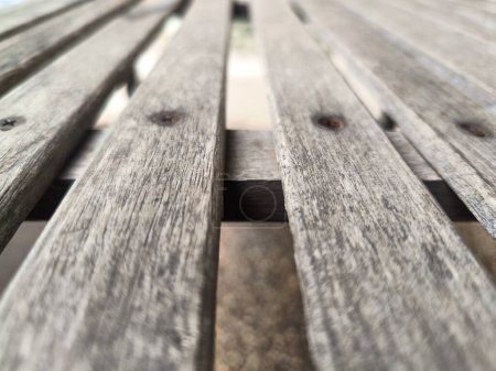 Wooden texture of a park bench close up