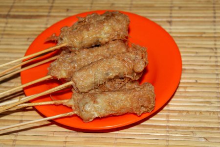 Several skewers of sempolan in a plate