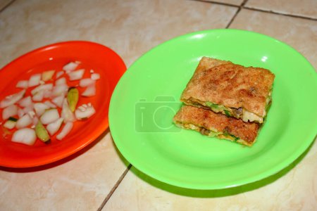 Photo for Egg martabak with sliced dish - Royalty Free Image