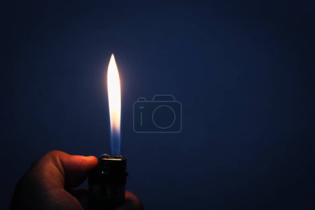 Gas lighter burns in the dark