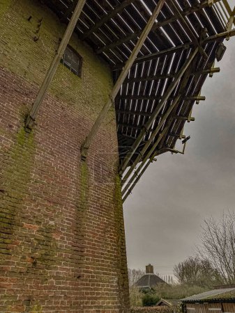 View of the old brick observation tower in the countryside