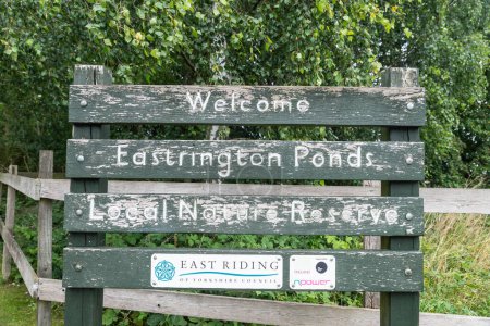 Photo for Eastrington, United Kingdom - August 13th, 2023: Welcome sign at the entrance of the Eastrington Ponds local nature Reserve - Royalty Free Image