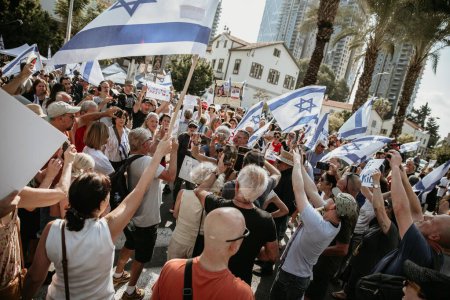 Photo for Tel Aviv, Israel - October 1 4, 2 0 2 3: spontaneous rally near the Ministry of Defense building, protesting against the government and for the release of kidnapped Hamas hostages at any cost. Horizontal - Royalty Free Image