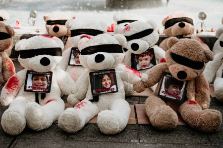 Photo for Dozens of teddy bears at Dizengoff Square in Tel Aviv.  Everyone has a name.  These are the names of children abducted by terrorists on October 7, 2023 and held in the Gaza Strip.  The youngest of them is not even a year old. - Royalty Free Image