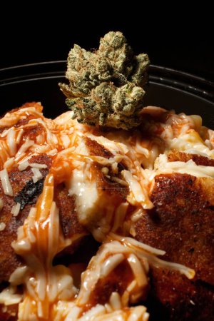 Photo for Cannabis on buffalo chicken food 1 - Royalty Free Image