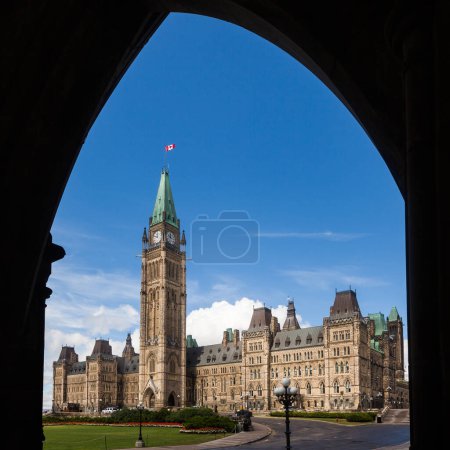 Photo for The Center Block and the Peace Tower in Parliament Hill, Ottawa, Canada. Center Block is home to the Parliament of Canada (Senate and Houses of Commons). It is a Canadian icon - Royalty Free Image