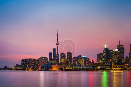 Photo for Skyline of Toronto over Ontario Lake at sunset - Royalty Free Image