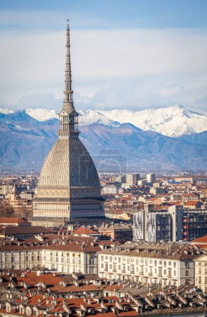 Photo for The Mole Antonelliana against snow caped Alps, Turin, Italy - Royalty Free Image