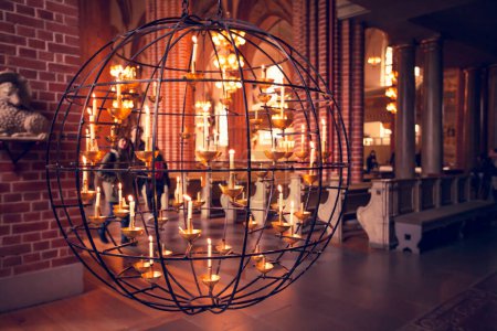 Photo for STOCKHOLM - CIRCA MARCH 2016: Beautiful spherical candelabrum in Storkyrkan, the Stockholm Cathedral, Stockholm, Sweden - Royalty Free Image