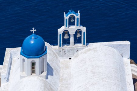 Photo for The Chapel of Panagia Theoskepasti against the blu waters of the caldera, Santorini, Greece - Royalty Free Image