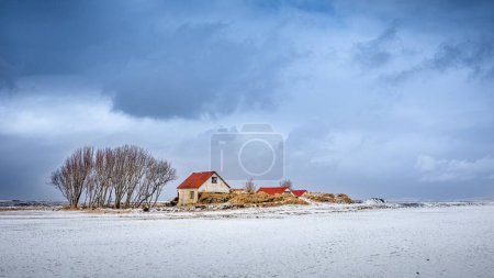 Photo for Colorful farm houses with snowy fields, Iceland - Royalty Free Image