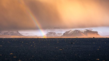 Photo for The glacial flood plain of Solheimasandur in winter with the Myrdalsjokull glacier in distance, Iceland - Royalty Free Image