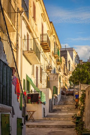 Photo for Picturesque facades and balconies in the old town of Vieste, Gargano, Italy - Royalty Free Image