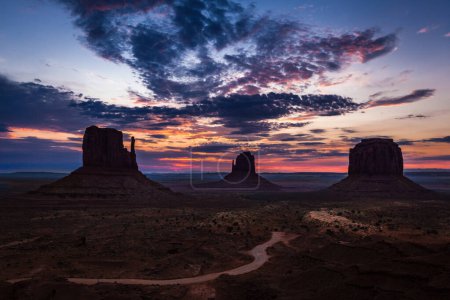 Photo for Famous view of Monument Valley before sunrise with the Mittens and Merrick butte - Royalty Free Image
