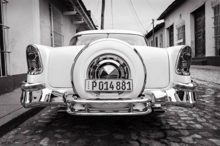 Photo for Beautiful classical american car, Trinidad, Cuba. Black and White. - Royalty Free Image