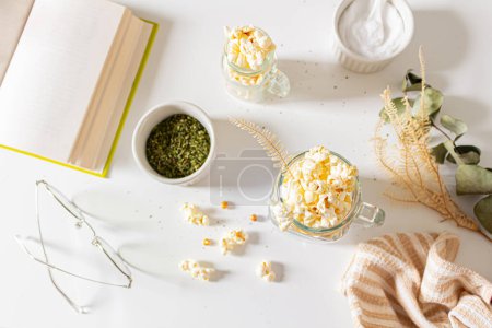 Photo for Top view of cozy composition with popcorn and spices. Autumn, winter food concept. - Royalty Free Image