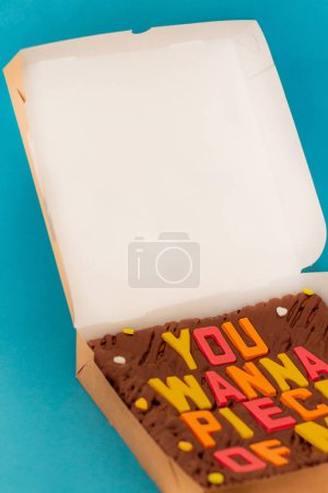 Photo for Brownie with the message: you wanna piece of me. Invite to eat concept. Modern food styling composition. - Royalty Free Image
