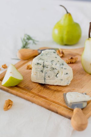Photo for Blue cheese and pears on the cutting board - Royalty Free Image