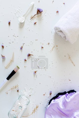 Photo for Health care spa concept. Mock up with spoon with bath salts on white background. Flat lay, top view. Beauty, lifestyle, skin care, composition. - Royalty Free Image