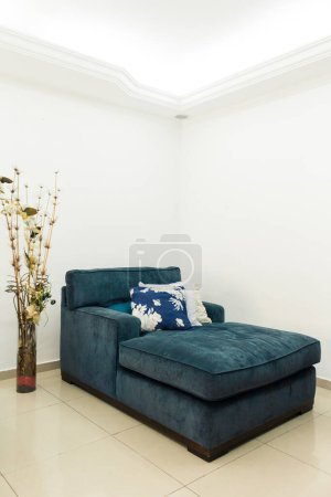 Photo for Classic living room interior with blue sofa and dried plants in big vase - Royalty Free Image