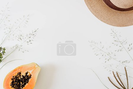 Photo for Half of tropical orange papaya fruit with hat. Minimalist fresh food composition. - Royalty Free Image