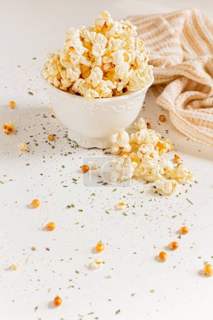 Photo for Cozy and aesthetic composition with popcorn in ceramic bowl. Autumn, winter food concept. - Royalty Free Image