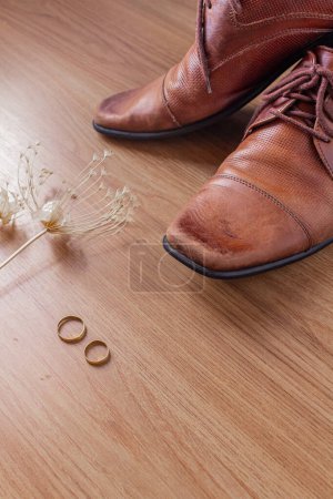 Photo for Men's elegant accessories. Brown shoes on a wooden background. Preparation for a wedding concept. - Royalty Free Image