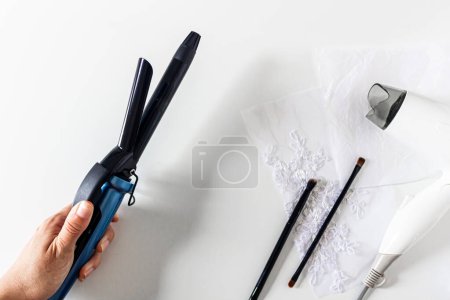 Photo for Beauty collage with straightener and hair dryer on white background. Flat lay, top view. Modern woman concept. - Royalty Free Image
