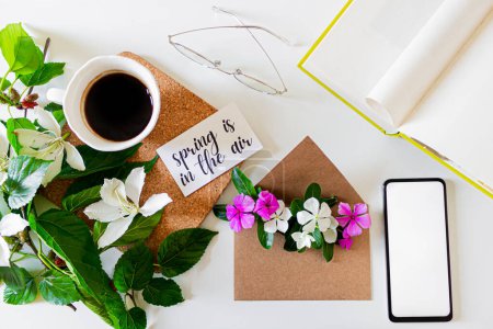 Photo for Inspirational quote: "friday". Laptop, note pad, book, glasses, linen fabric, cup of coffee and white flowers collage. Flat lay, top view. Aesthetic, freelancer, blogger, home office workspace. - Royalty Free Image