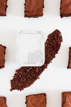 Photo for Delivery package with pieces of cake on white background. Chocolate flavor composition. Modern candy shop concept. - Royalty Free Image