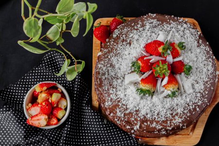 Photo for Chocolate, coconut and strawberry cake on background. - Royalty Free Image