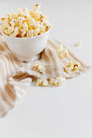Photo for Cozy and aesthetic composition with popcorn in ceramic bowl. Autumn, winter food concept. - Royalty Free Image
