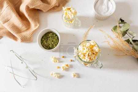 Photo for Top view of cozy composition with popcorn and spices. Autumn, winter food concept. - Royalty Free Image